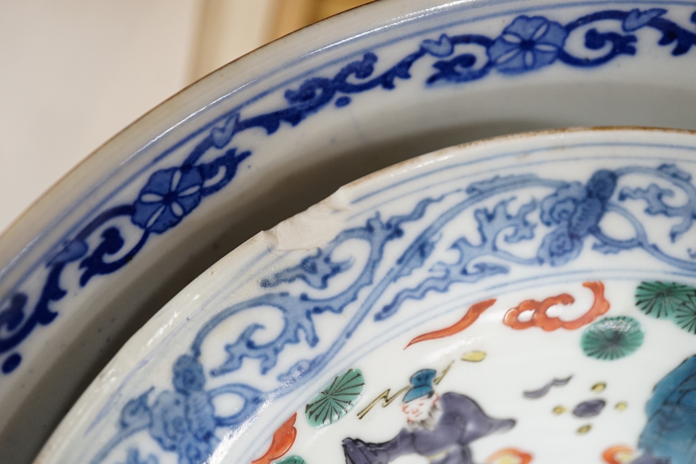 A group of Japanese and Chinese ceramics to include two blue and white jars, a wucai bowl etc.